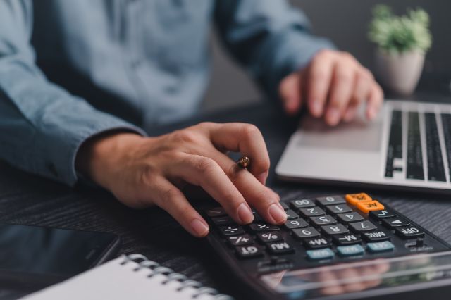 Accountant doing detailed and accurate bookkeeping for a business client
